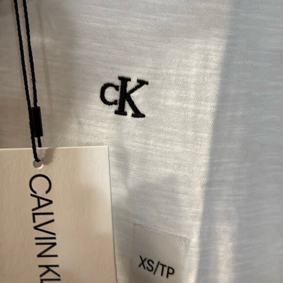 NWT Calvin Klein Jeans White With Black Logo Polo Shirt Size X-Small - Picture 3 of 5